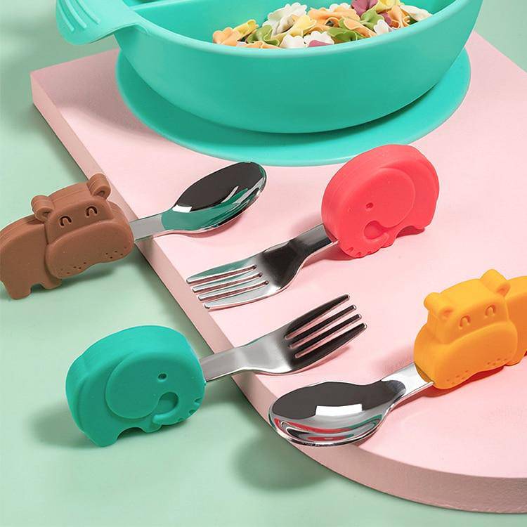 http://www.justawonderland.com/cdn/shop/products/eprolo-baby-gadgets-tableware-set-children-utensil-stainless-steel-toddler-dinnerware-cutlery-cartoon-infant-food-feeding-spoon-fork-30094050623663.jpg?v=1624645687